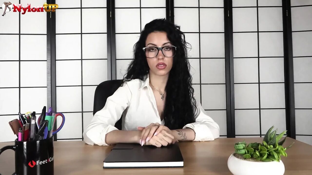 Curly-haired Lady Boss Punishes Her Horny Secretary with a Sensual Foot Worship
