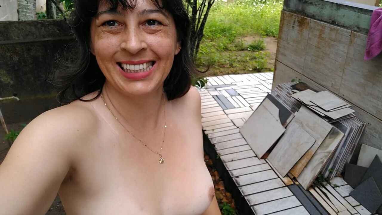 Wife walking naked outside. She makes pee and touch herself.