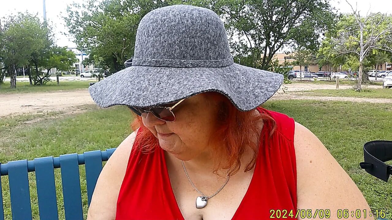 Nurse Vicki Smoking in the Park on a Bench All Dressed up