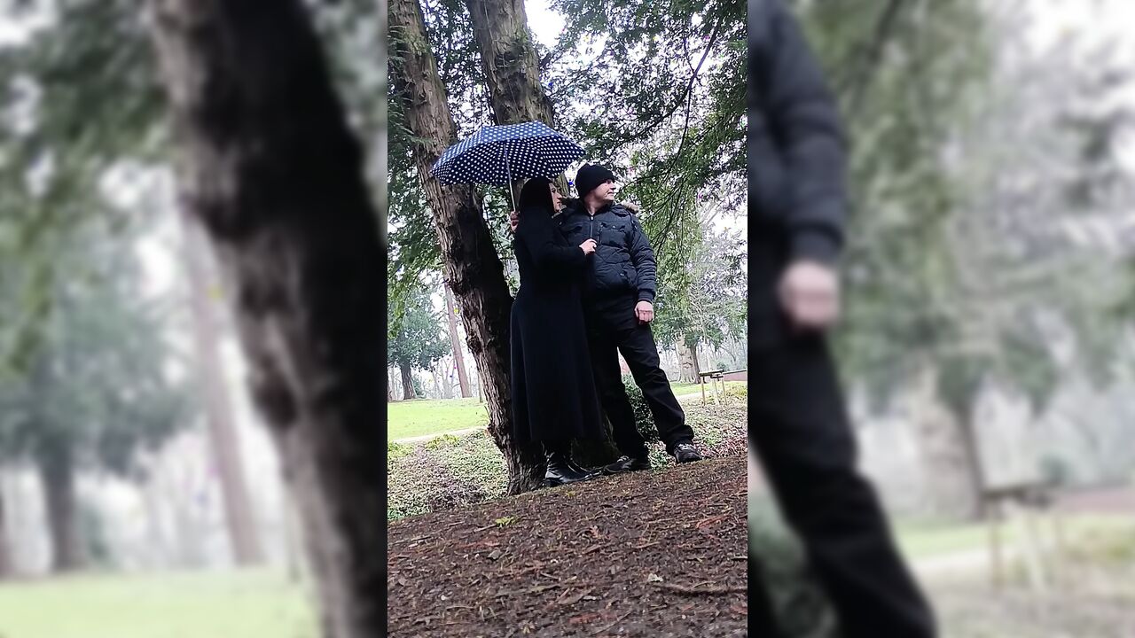 Muslim woman plays and blows a large cock outside in the park