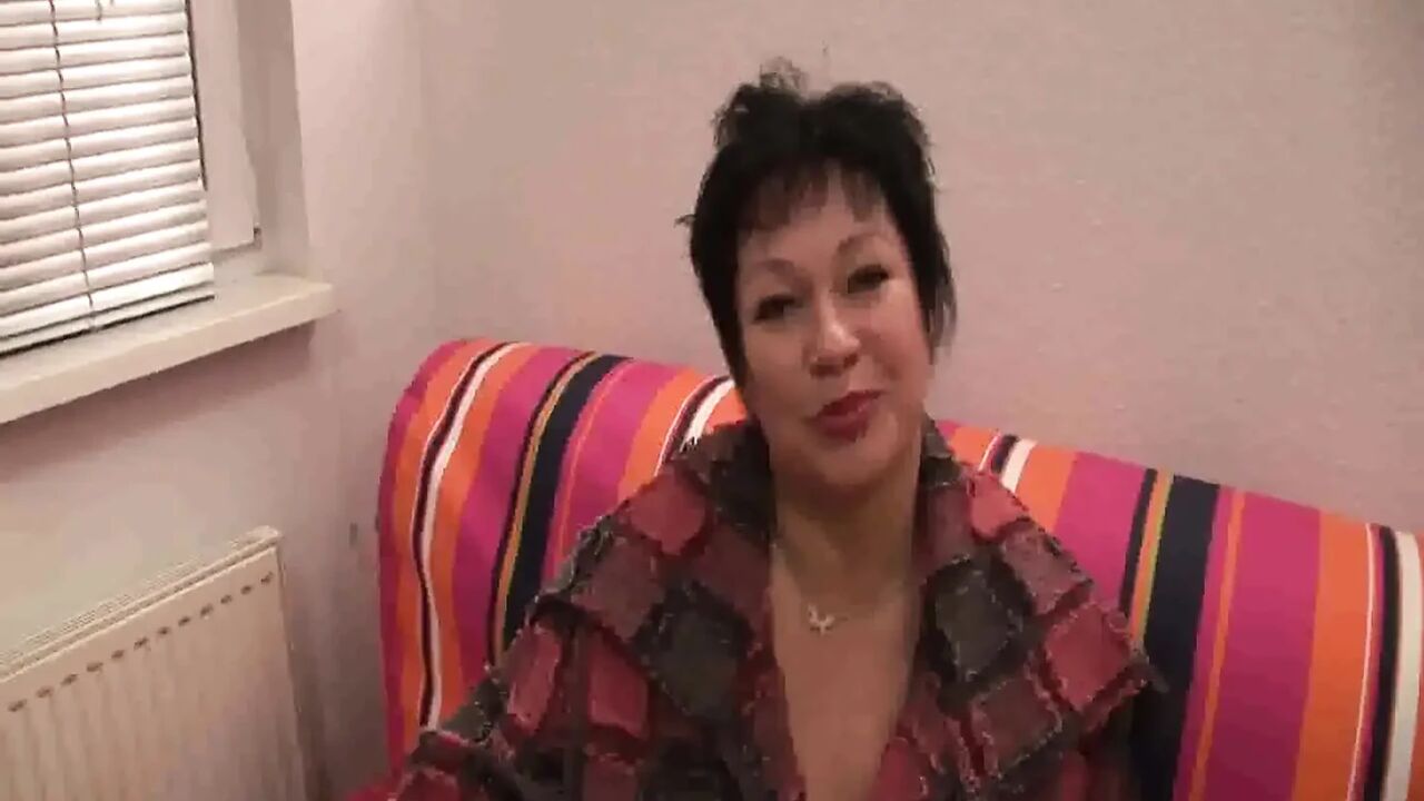 Brunette gilf with big boobs masturbating and blowing cock