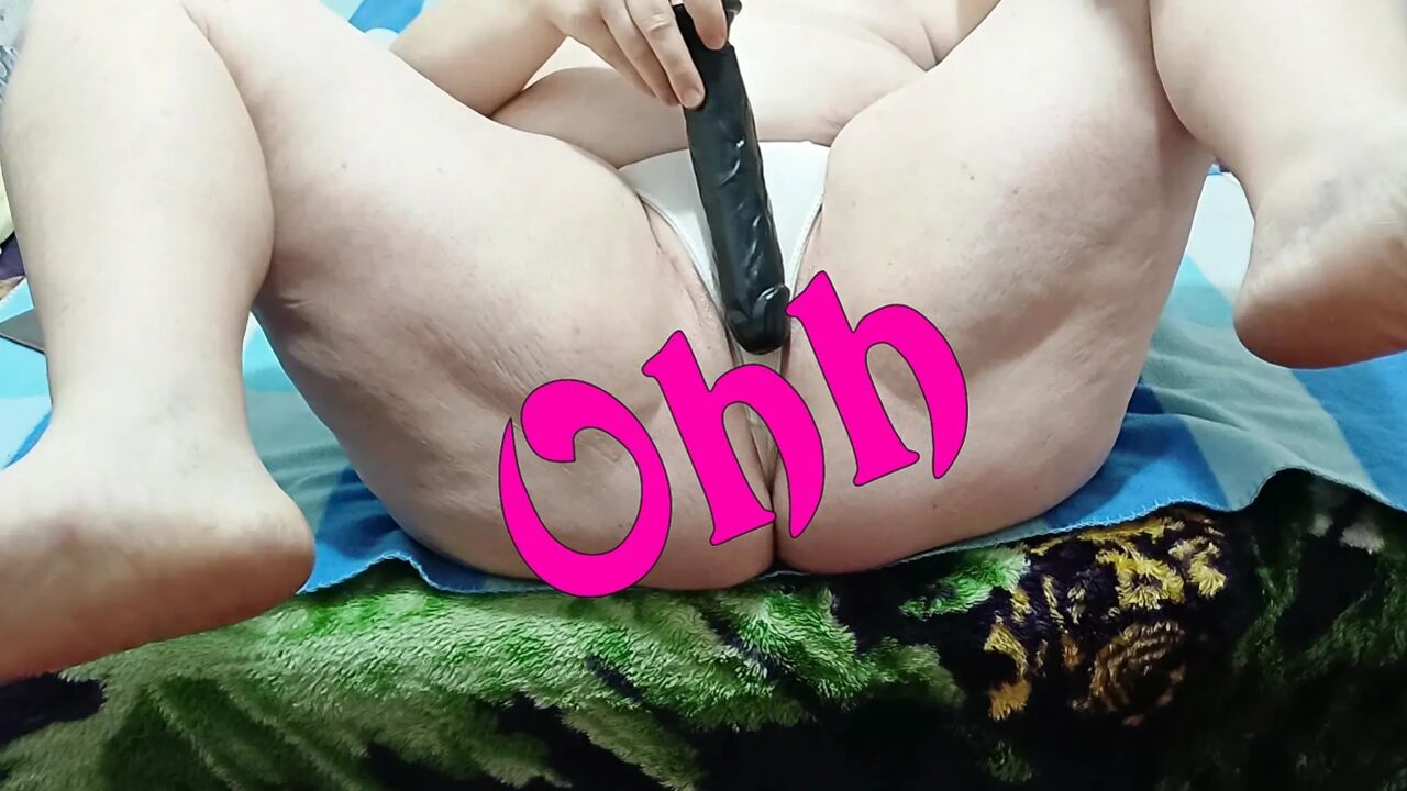 Enjoying in panties with a black phallus