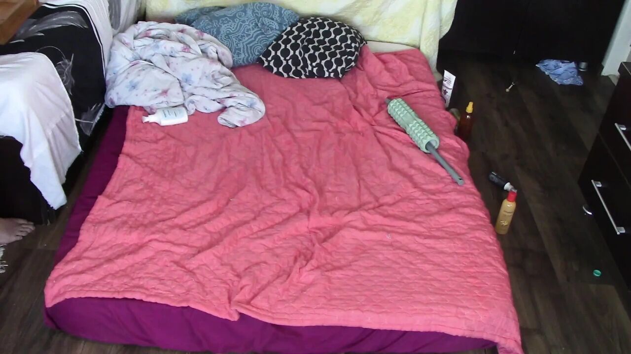 Foreplay in the bedroom with an amateur couple.