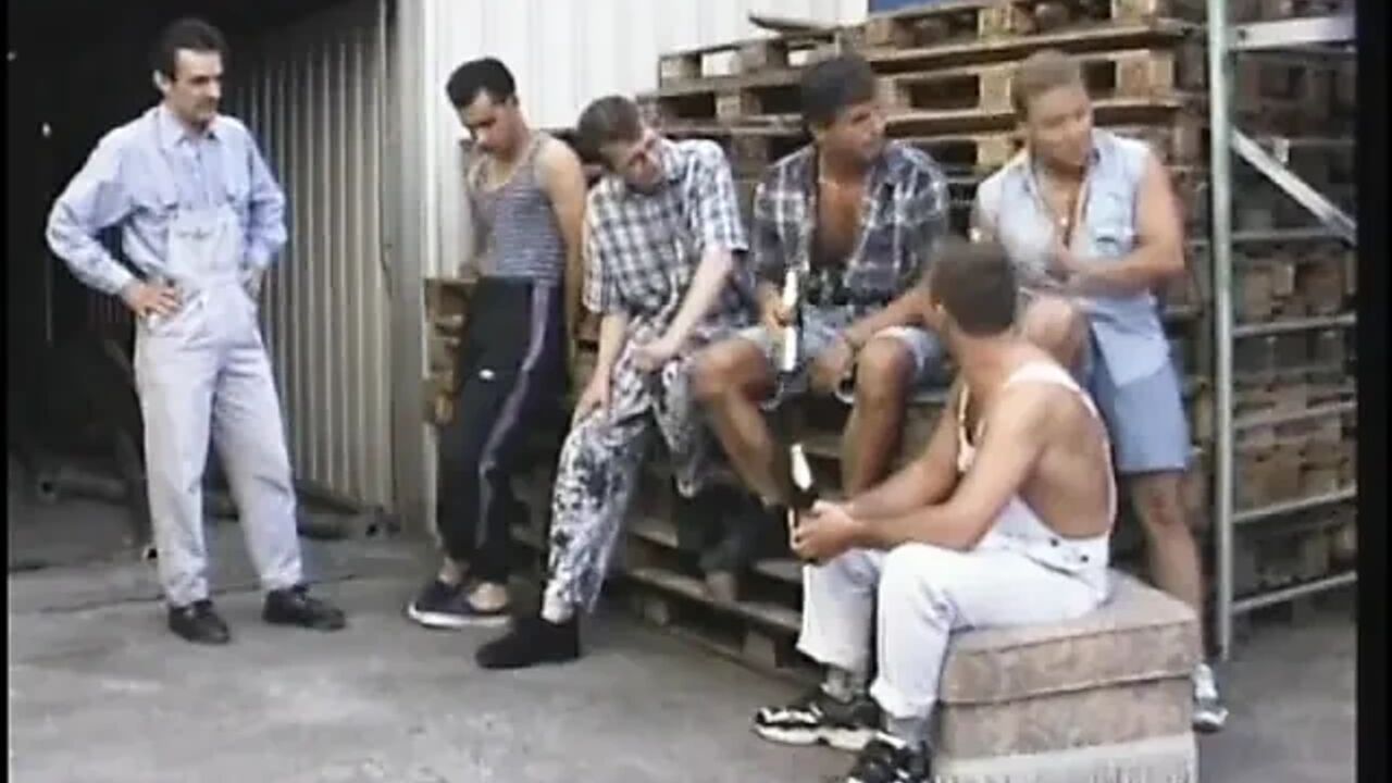 Dirty old blonde gets fucked from behind while sucking cock in gang bang