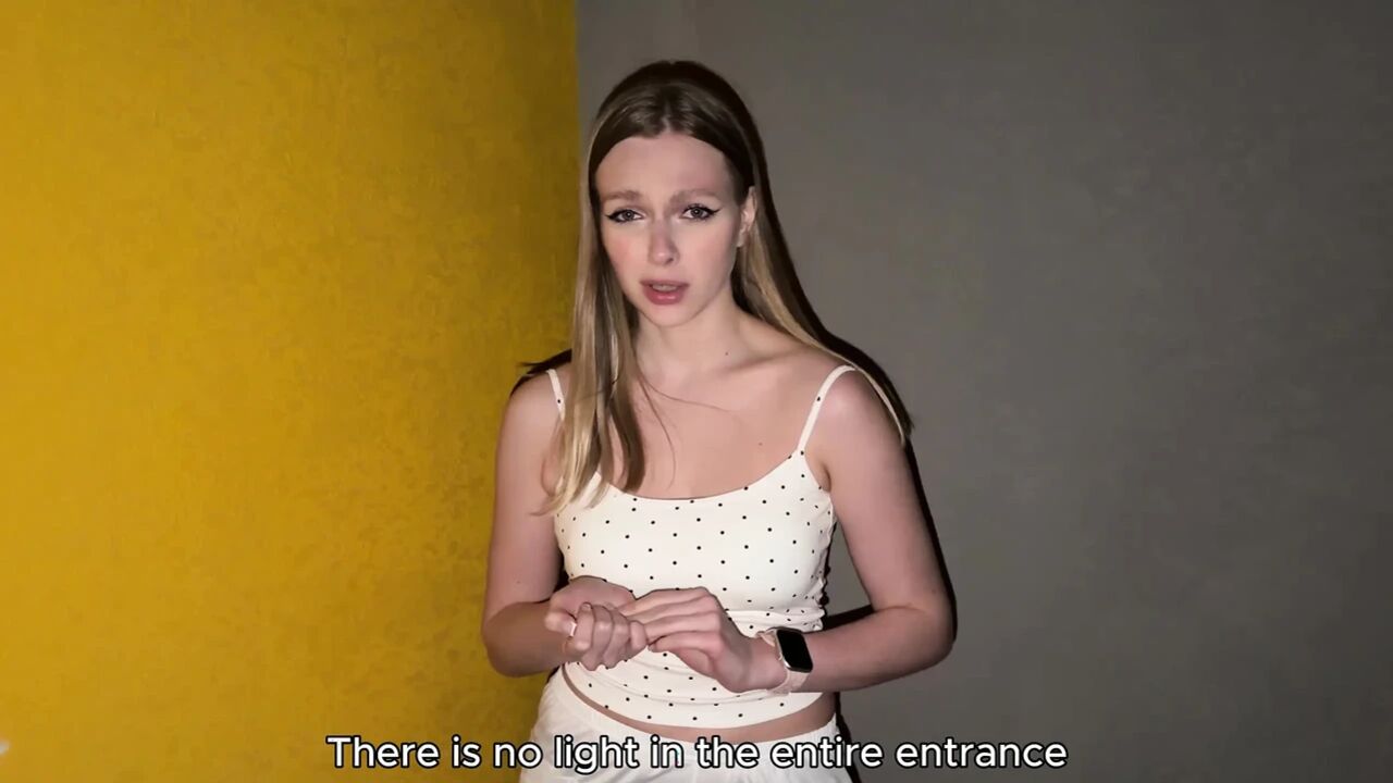 A young neighbor gives a blowjob in the entrance hall and has rough sex