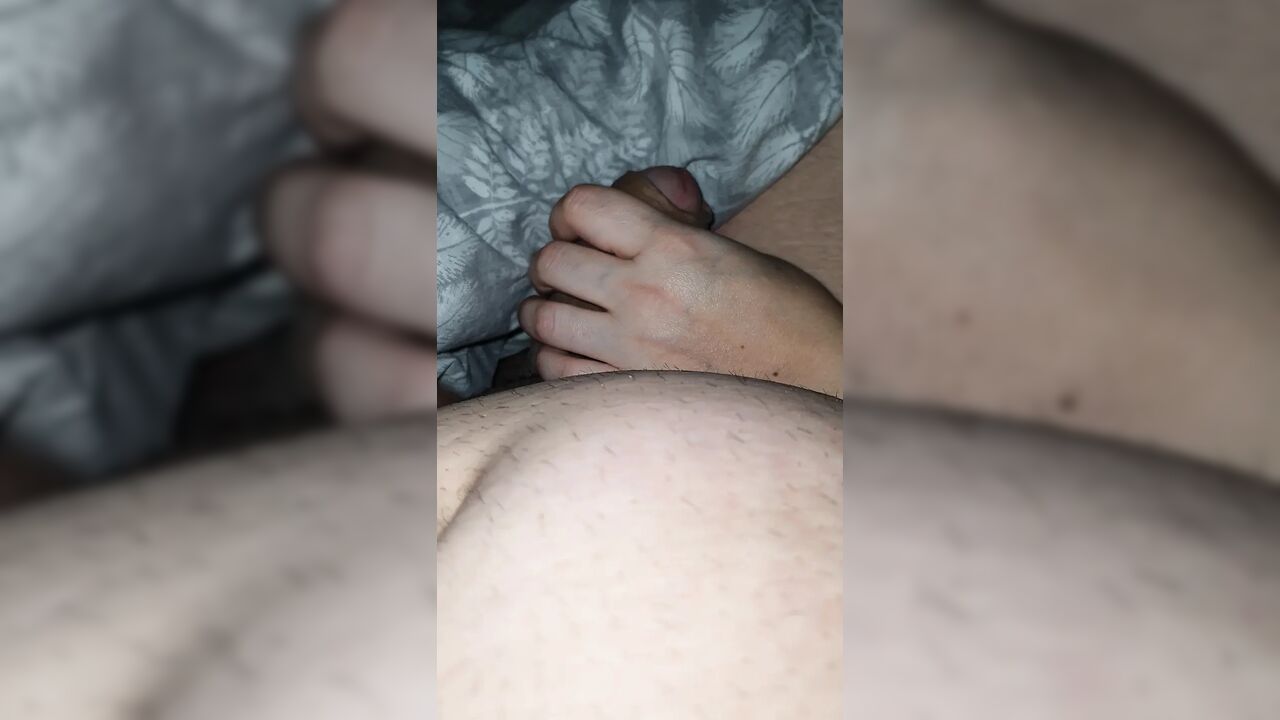 Step mom surprised step son by pulling out his dick under blanket and handjob his cock