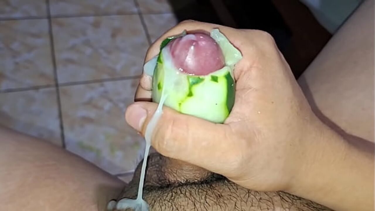 Jerking off with a cucumber