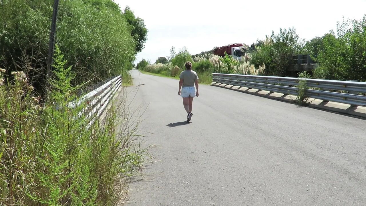 Patricia on the bridge over the road