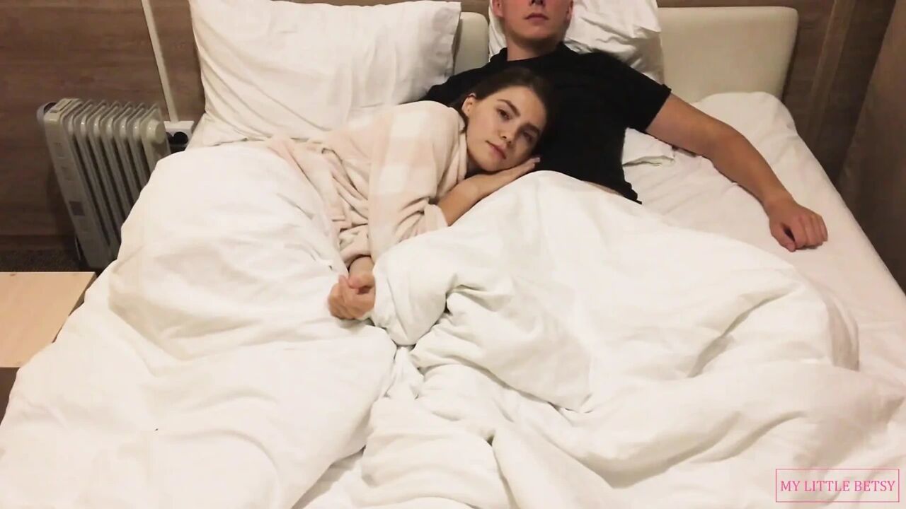 Hottie Gives a Relaxing Home Blowjob While Watching a Movie