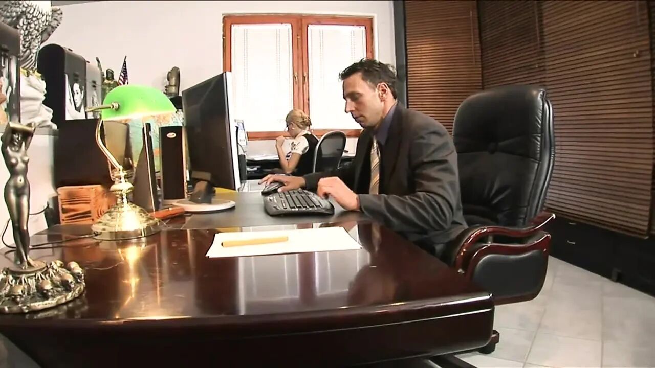 Very hot secretary in black stockings and high heels knows how to please her boss