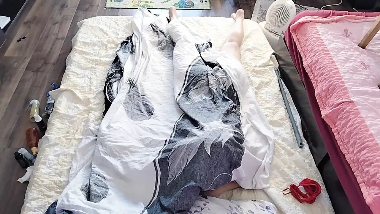 Sensual massage of a hot couple with oil on the body.