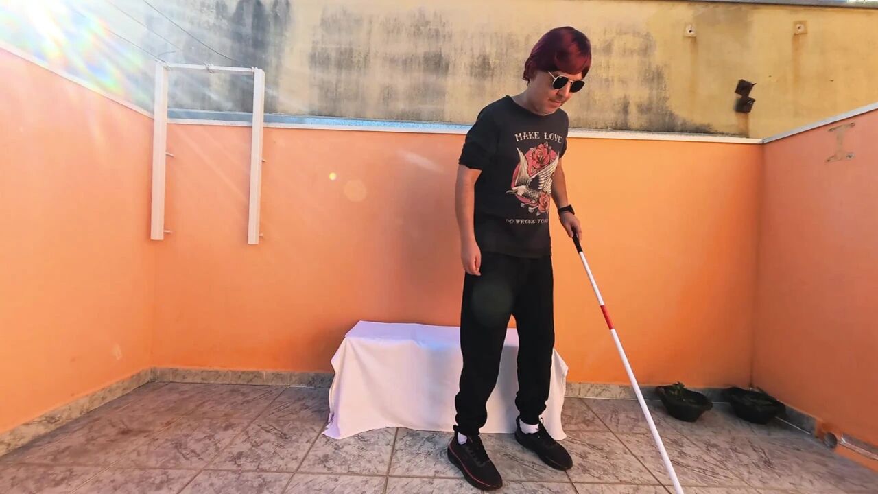 Blind man has a lucky day while resting in a public place.
