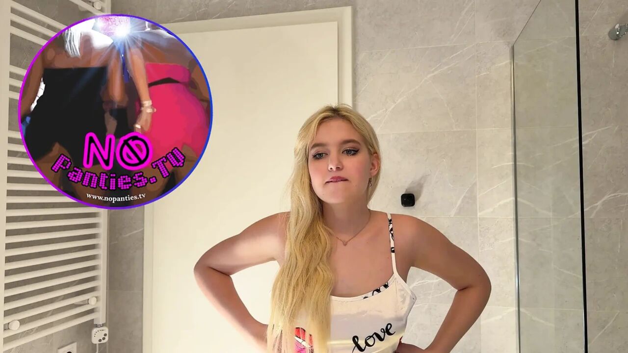 Super hot sexy blonde college girl in a satin nightie prepares for the night in the bathroom