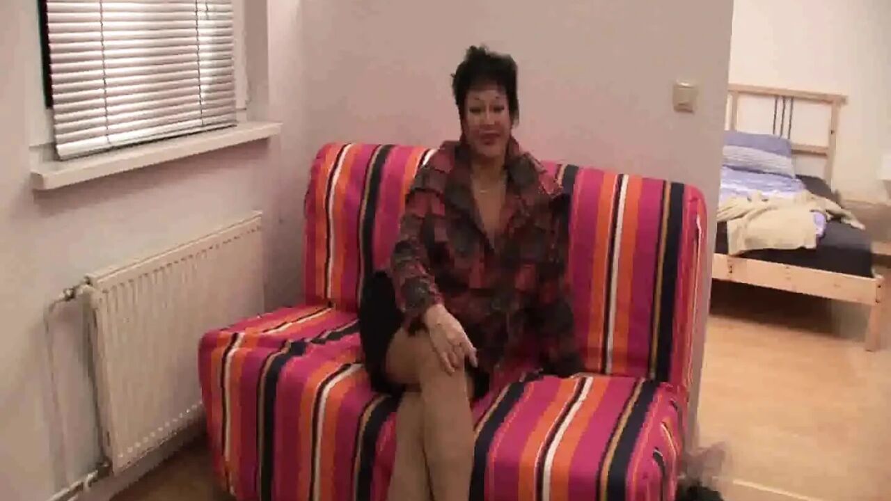 Brunette gilf with big boobs masturbating and blowing cock