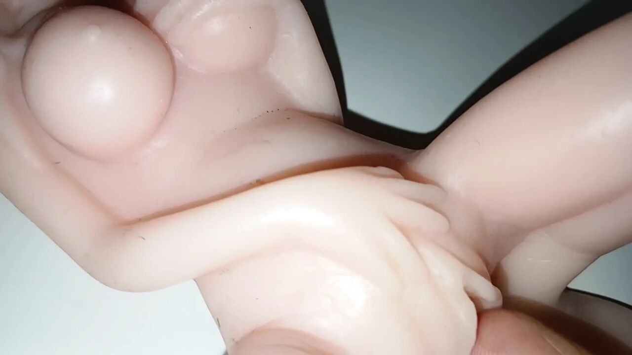 Mini sex doll fucked by big fingers