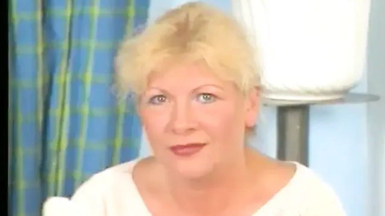 Blonde gilf wearing stockings while dildoing pussy