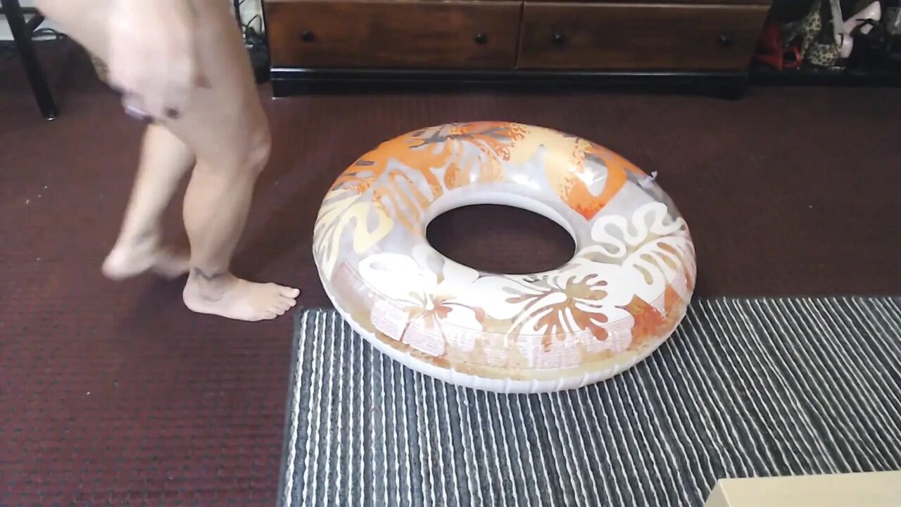 Nude milf deflates pool tube inflatable