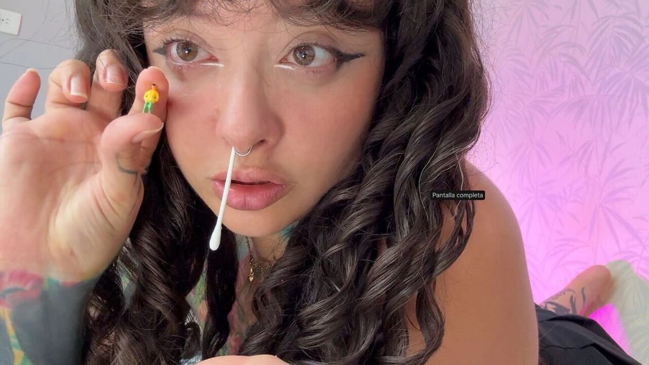 Giantess Shoves a Shrunken Man up Her Nose