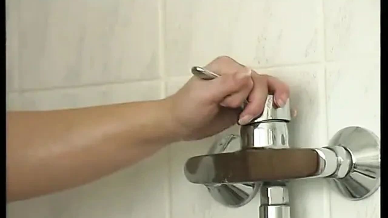 Short hair teen is having a shower