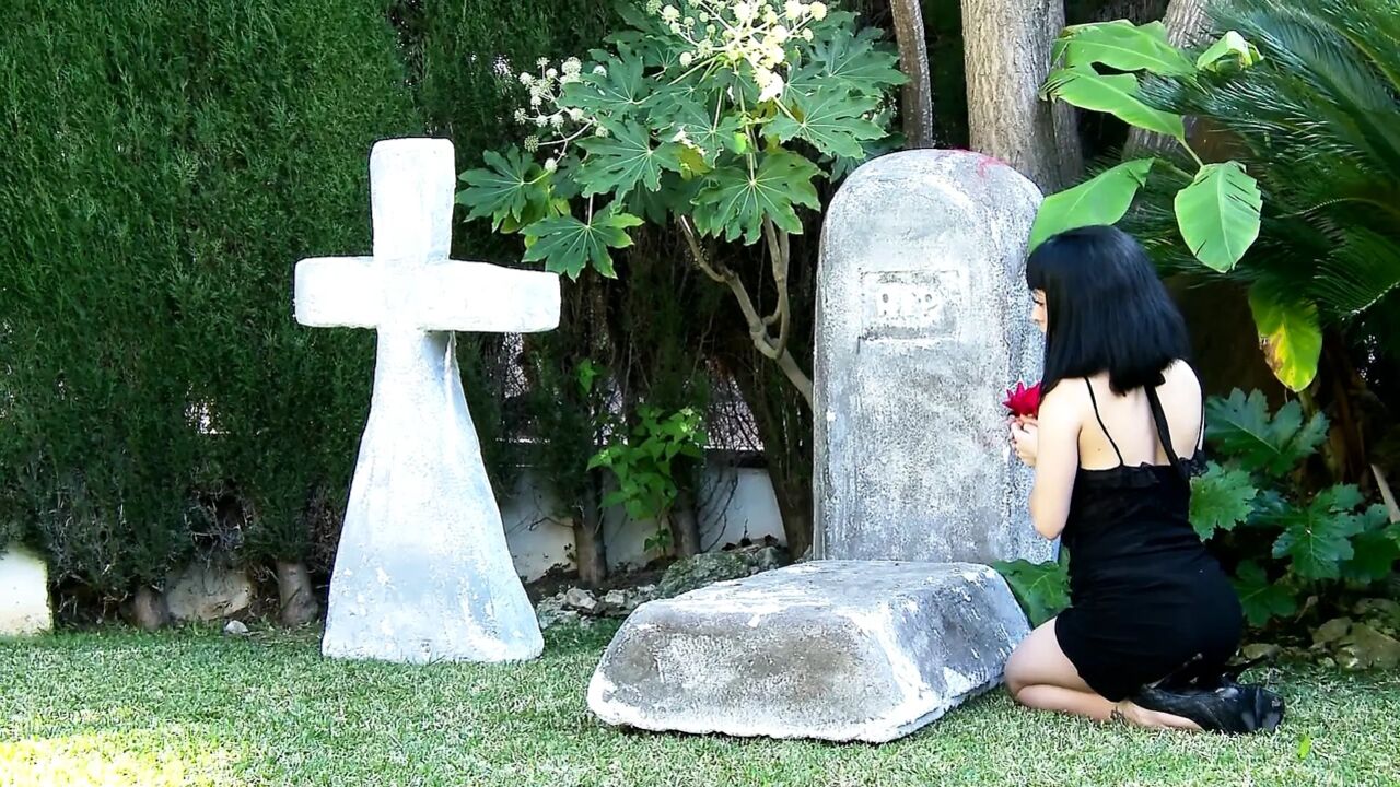 After she mourns, she has a hard fuck with the gardener