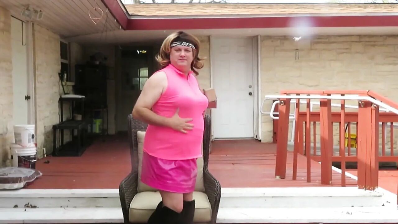 Brittney CD modeling her new pink outfit and boots