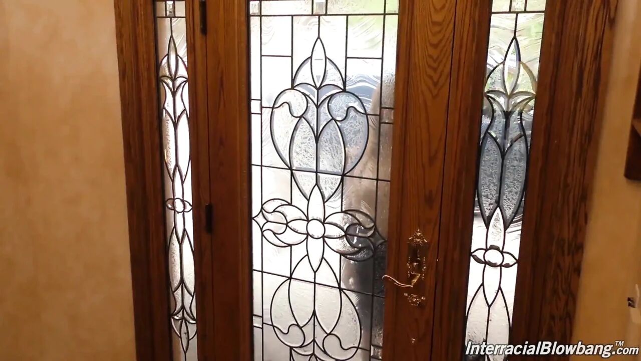 Cherie Deville gives blowjob to a group of black guy