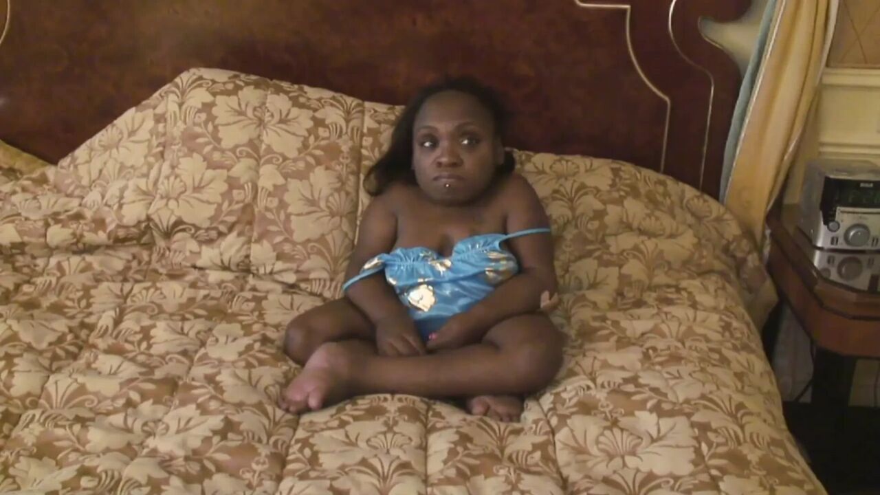 Ebony midget gets sprayed on her belly