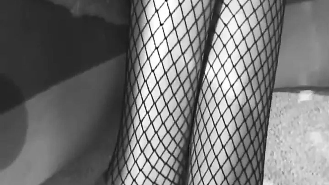 A Big Black Cock Doggystyle Bangs the Round Ass of a Black Pussy in Fishnet Stockings