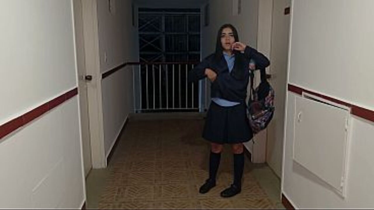 I find my neighbor in her school uniform outside her house