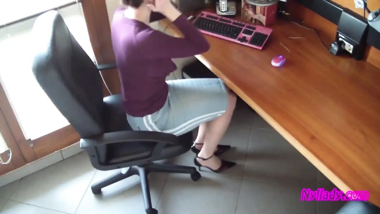 In the Office Wearing Black and Purple Pumps