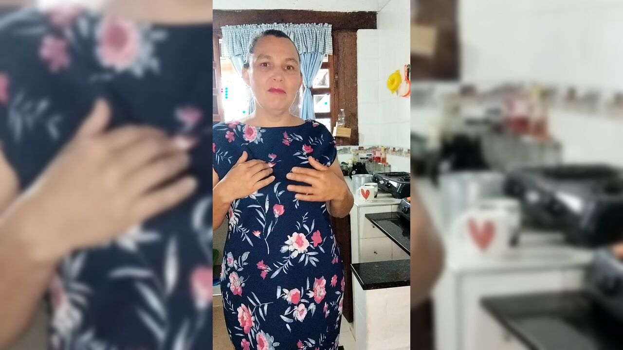Single mother masturbates with her fingers