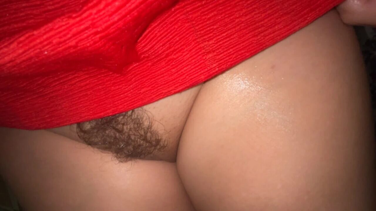 A MILF with a very hairy pussy squirts from an orgasm