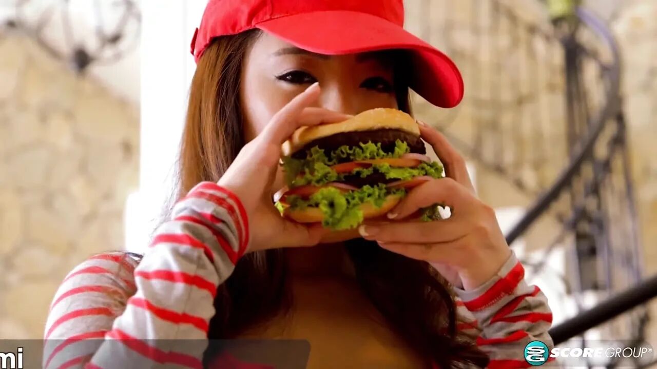 Busty Asian natural Hitomi puts the hooters in Hooter's