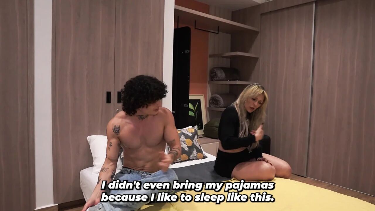 Busty Blonde Stepmother Ends Up Sharing Hotel Bed with Her Tattooed Stepson