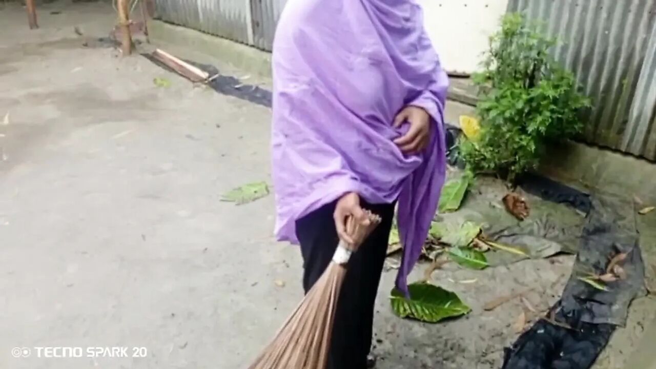 Girl Sweeping the Yard Naked in the Rain – Outdoor Scene