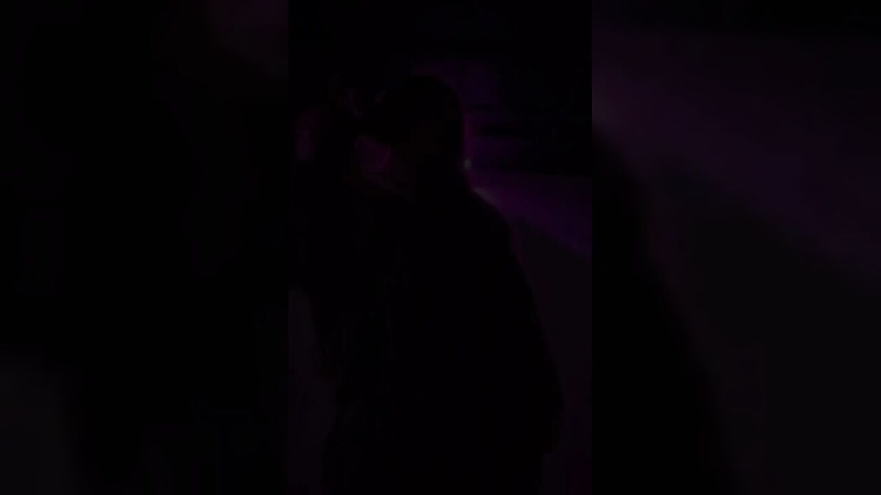 Smoking a Cigarette Outdoor While Wearing Only a Bikini and a Jacket