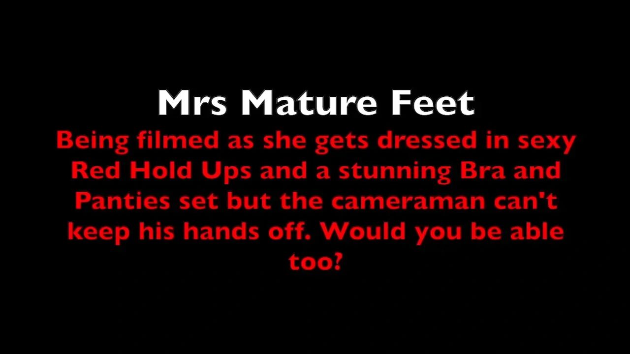 Mrs Mature Feet getting dressed and the camera man can't help himself. 388
