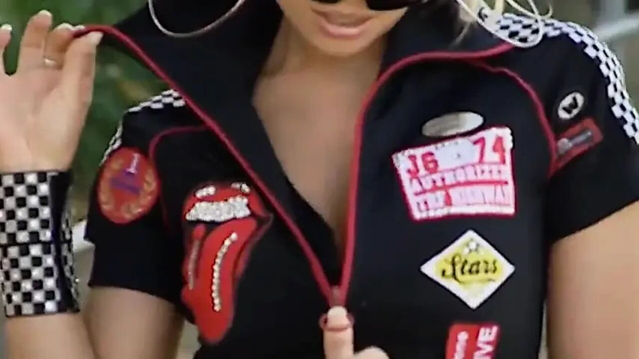 This Beautiful Biker Shows You the Curves of Her Body and Those of Her Motorbike