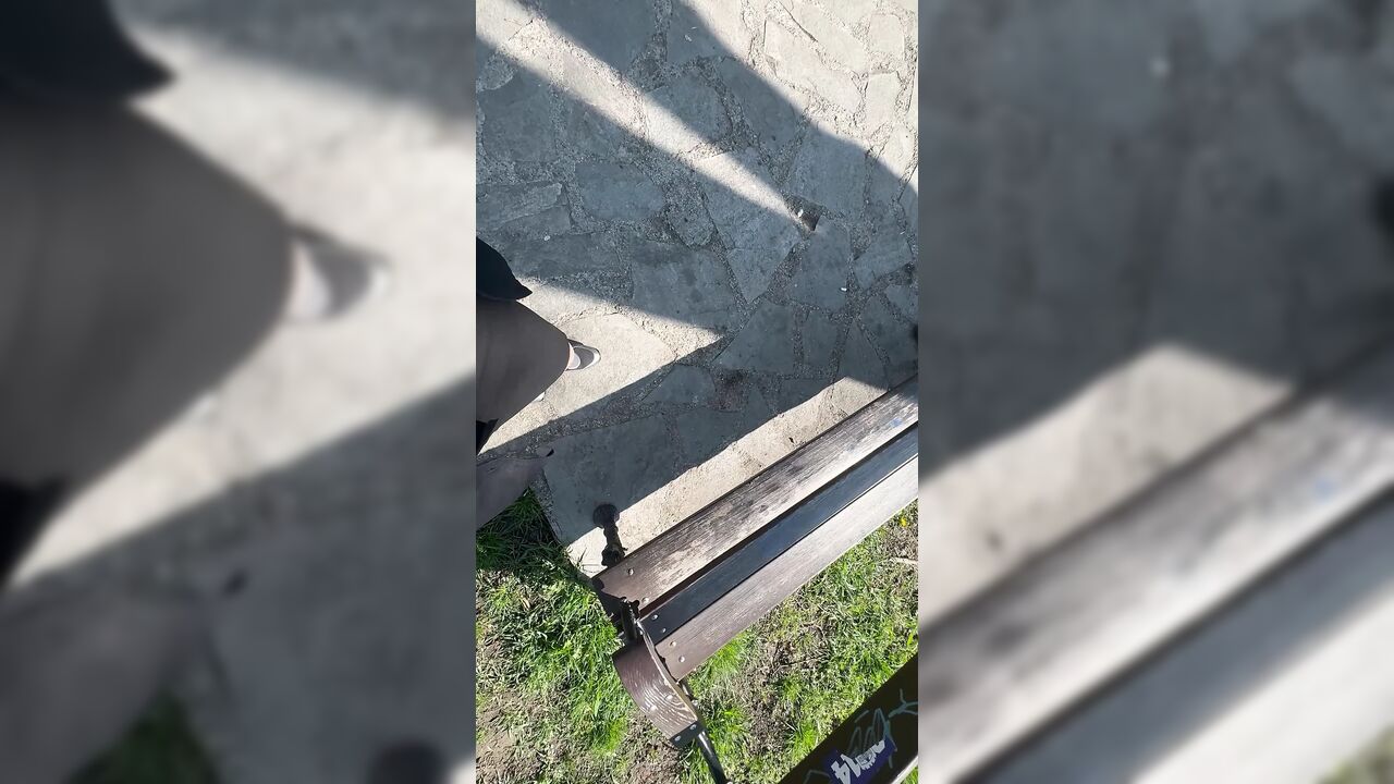 Sexy hot stepmom is horny and caresses herself on a park bench