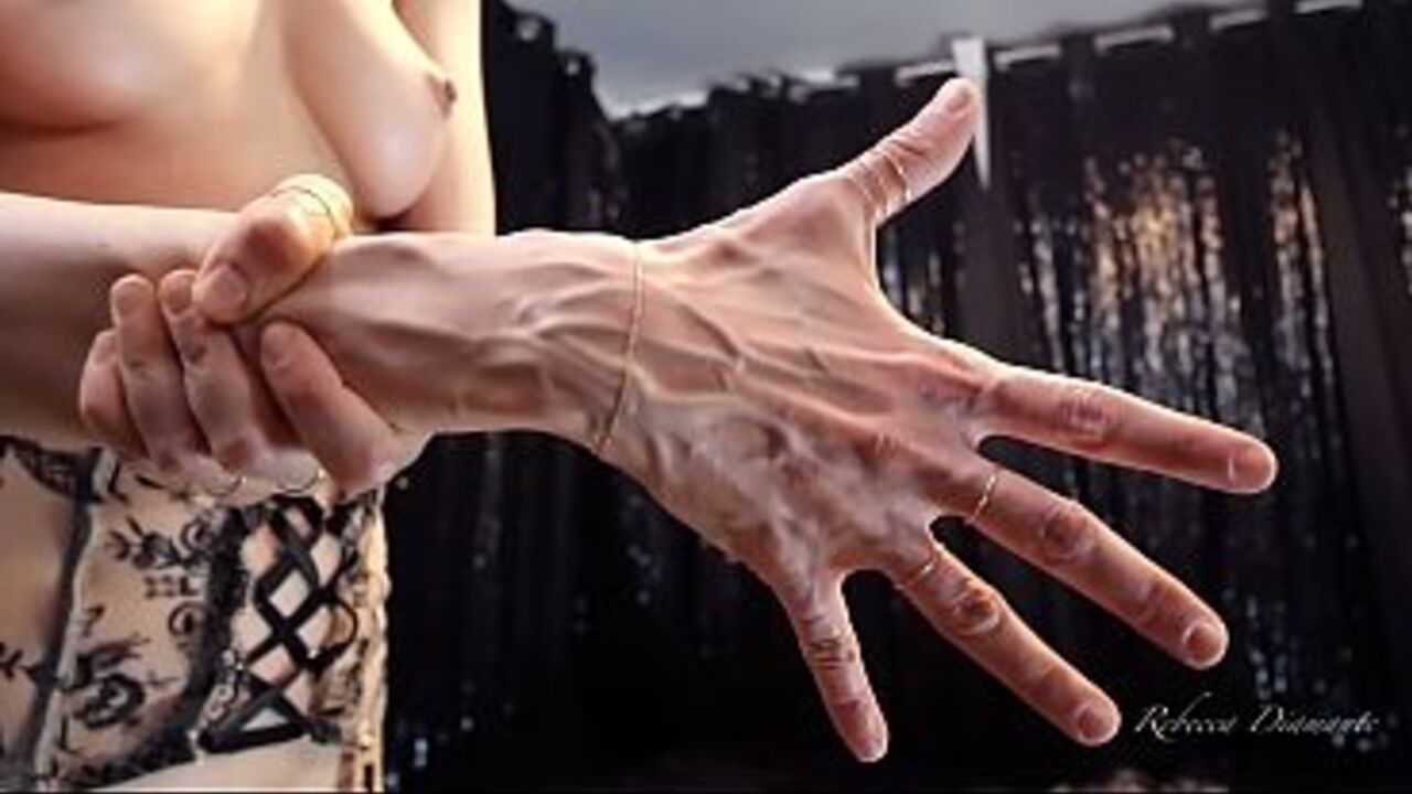 Rebecca Diamante shows her hands' veins in topless