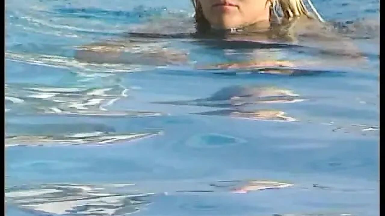 Blonde girl sucks a huge dick to a tits cumshot by the pool