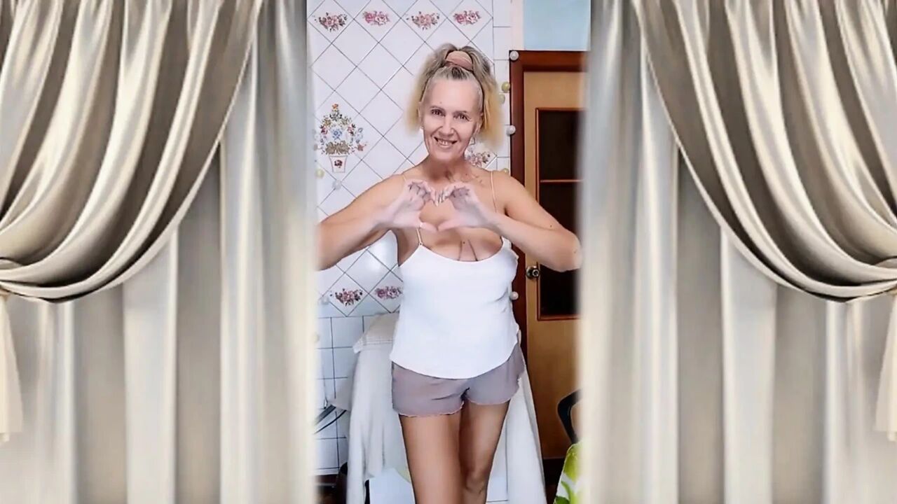 Granny Dressing up and Performing Female Masturbation at Home in the Kitchen