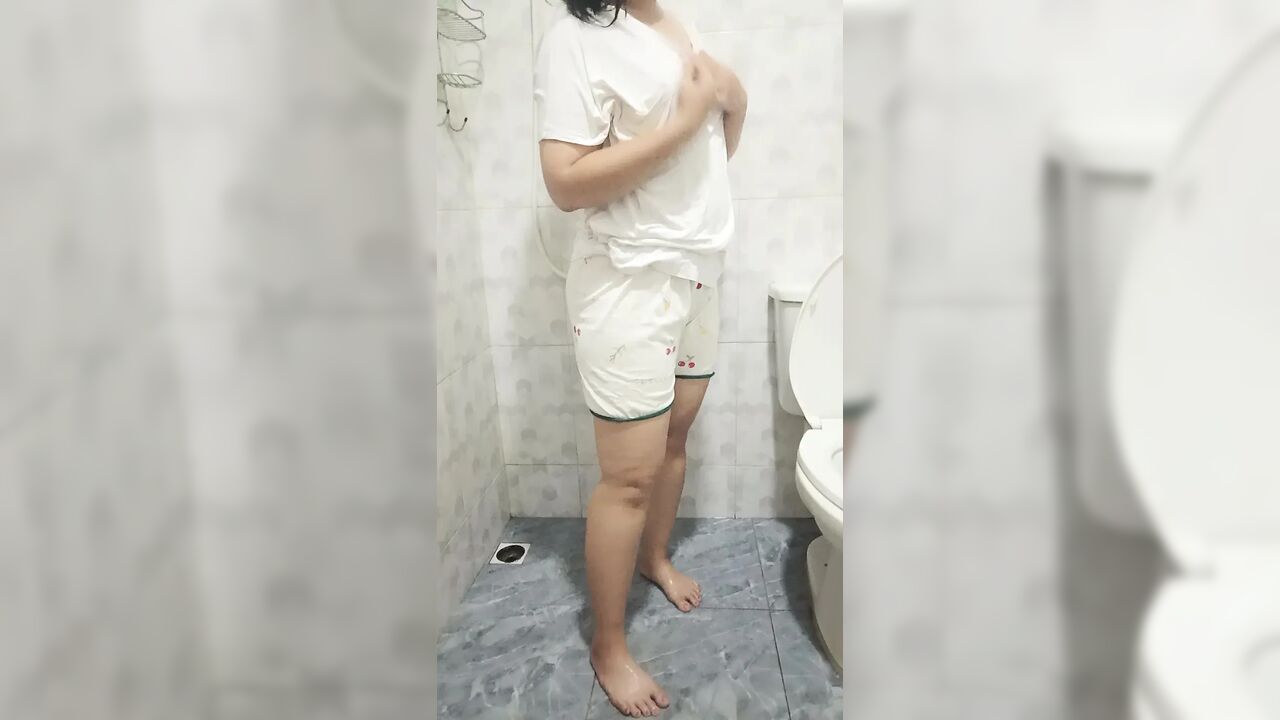 Plump girl takes a shower