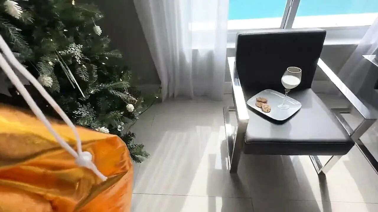 Busty MILF Brandy Renee is gonna make sure Santa is on the naughty list this year by fucking him under the Christmas tree