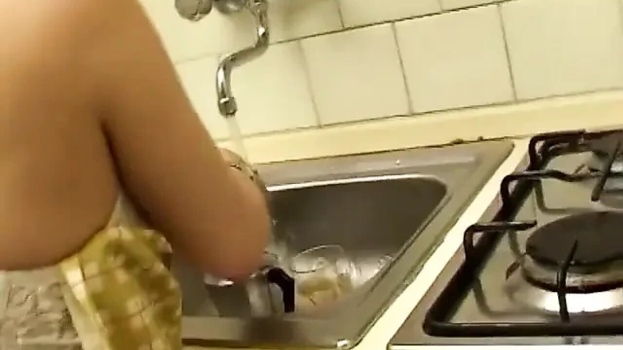Masturbation in the kitchen for the mature slut