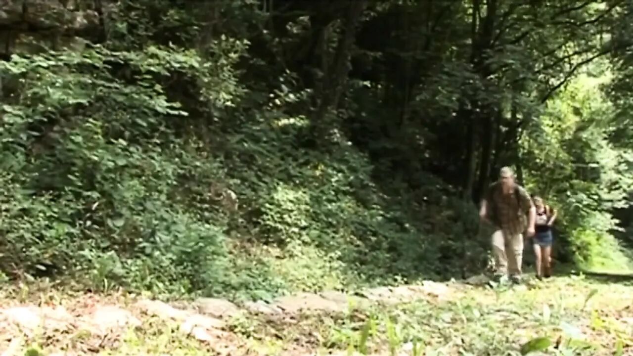 Naughty teen gets fucked by a mature guide in the woods