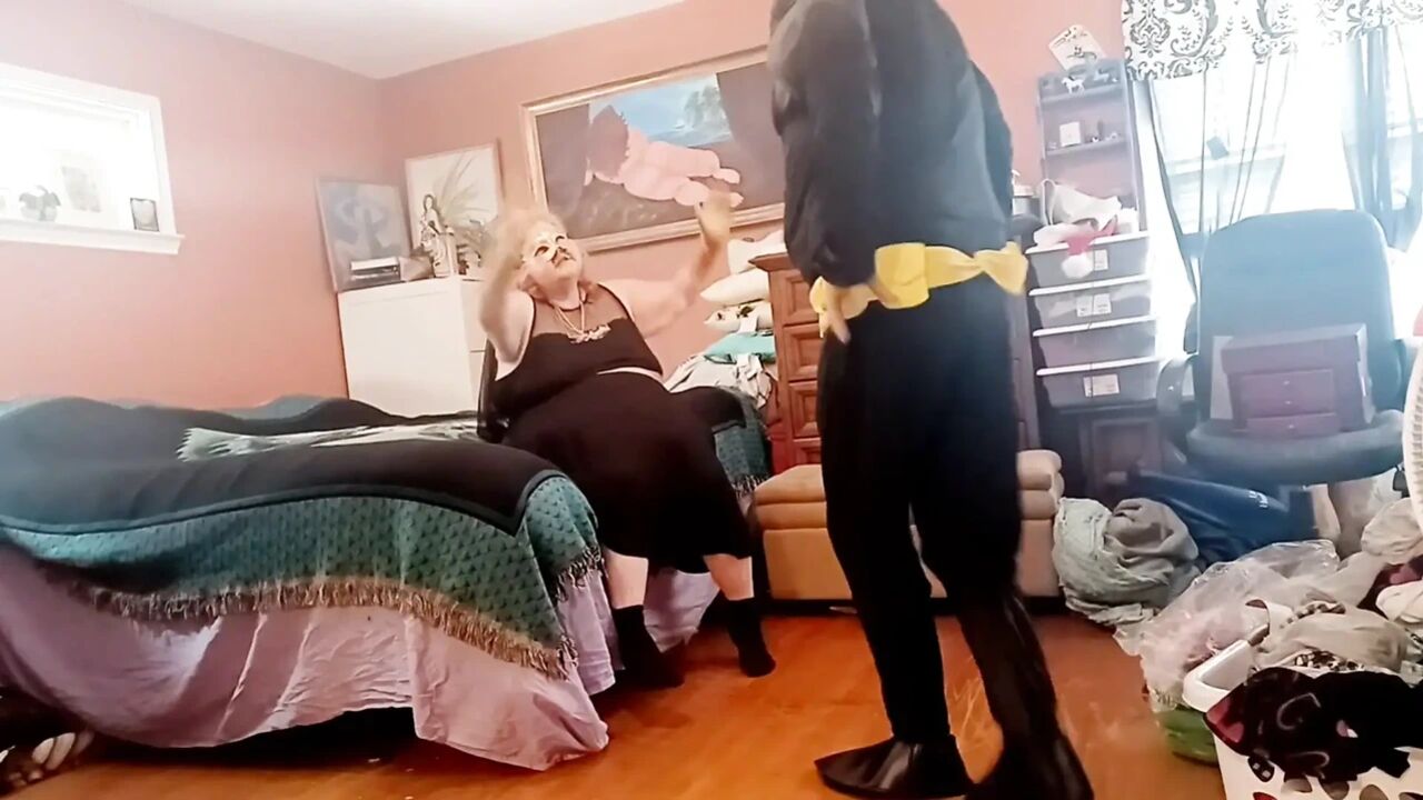 Bat Girl (nurse Vicki) Gives Bat Man a Blow Job!