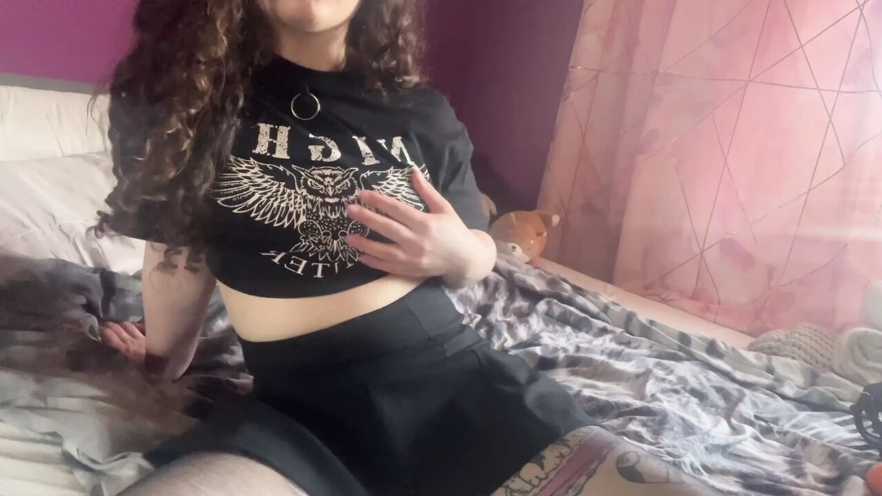 Goth girl plays with her tight little pussy