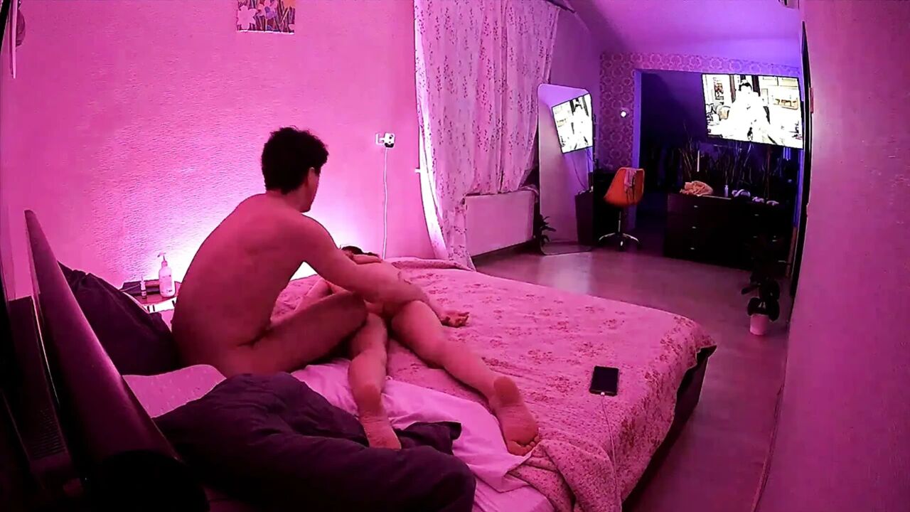 Kamila and Danildo cuddling in bed