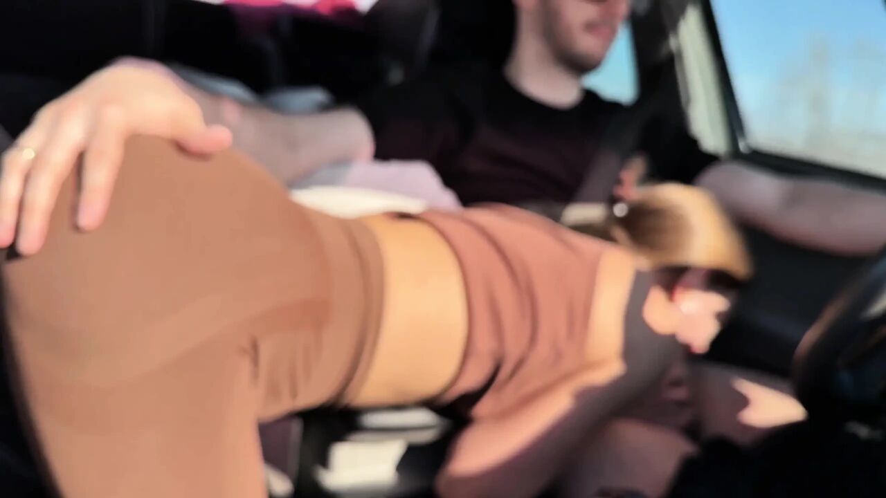 Sucking Her Driver Behind the Wheel